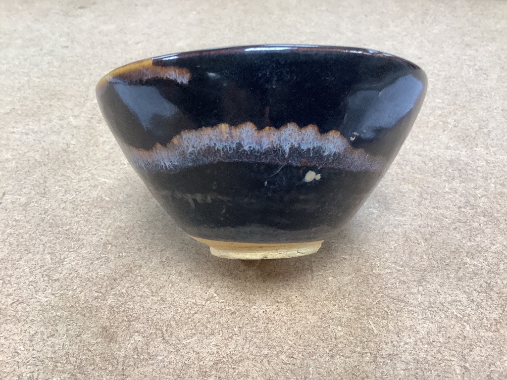 A Chinese blackware splashed bowl 11cm diam